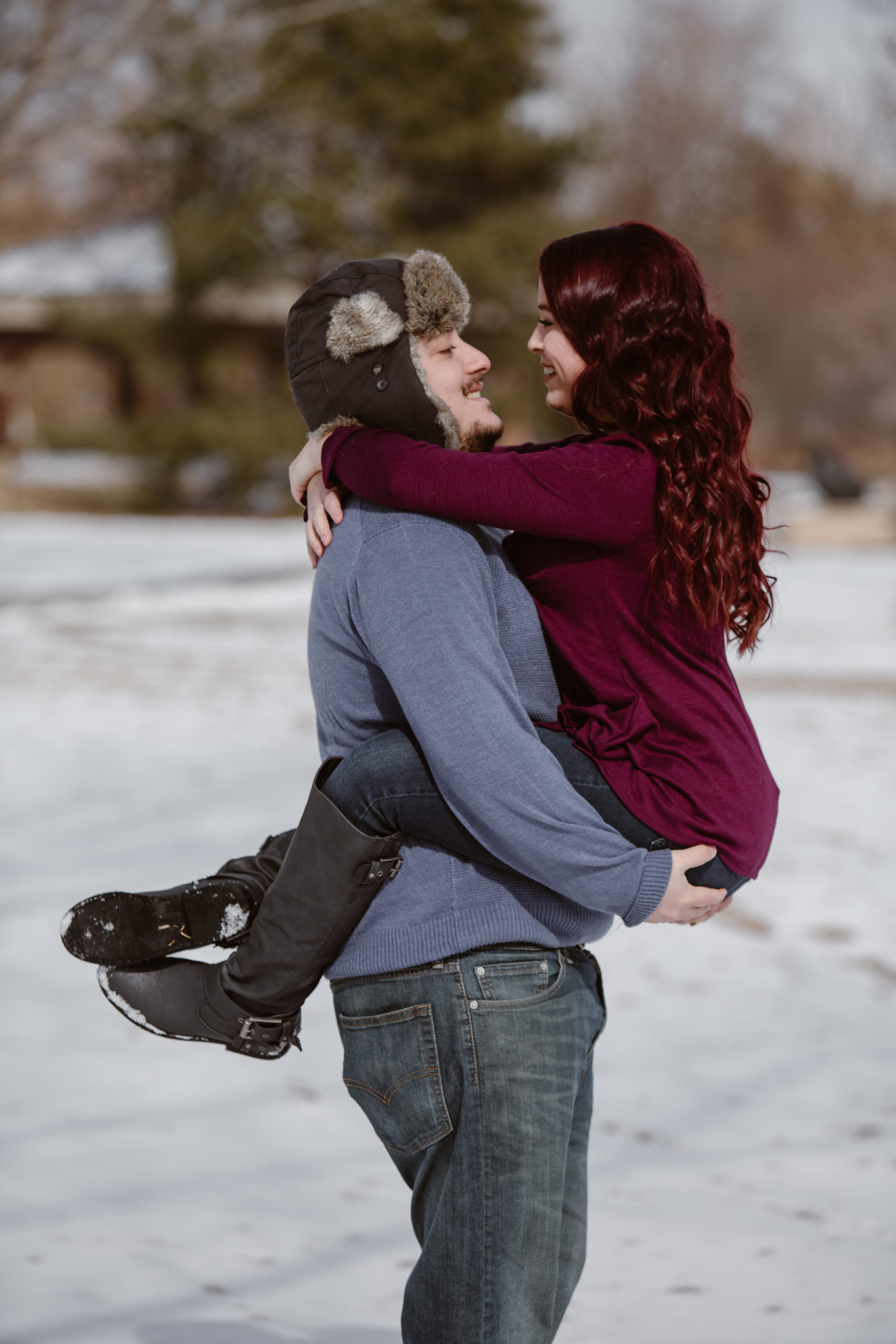 Man picked up his fiancé both of them smiling