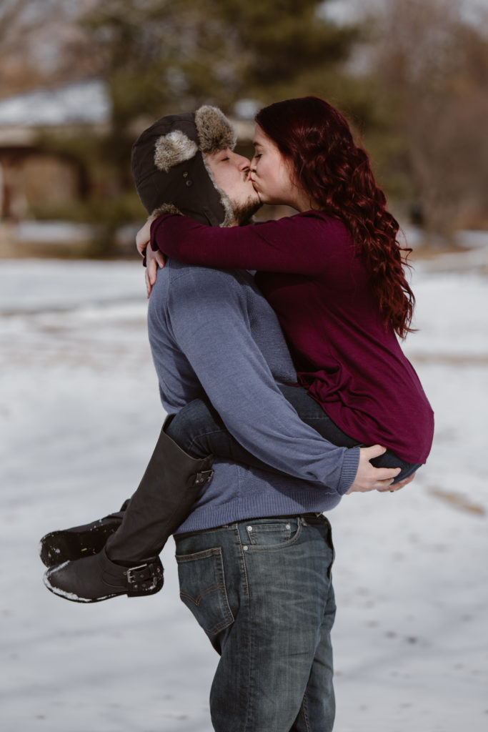 Man picked up his fiancé and kissing her