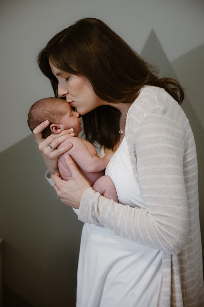 Mom holding newborn baby