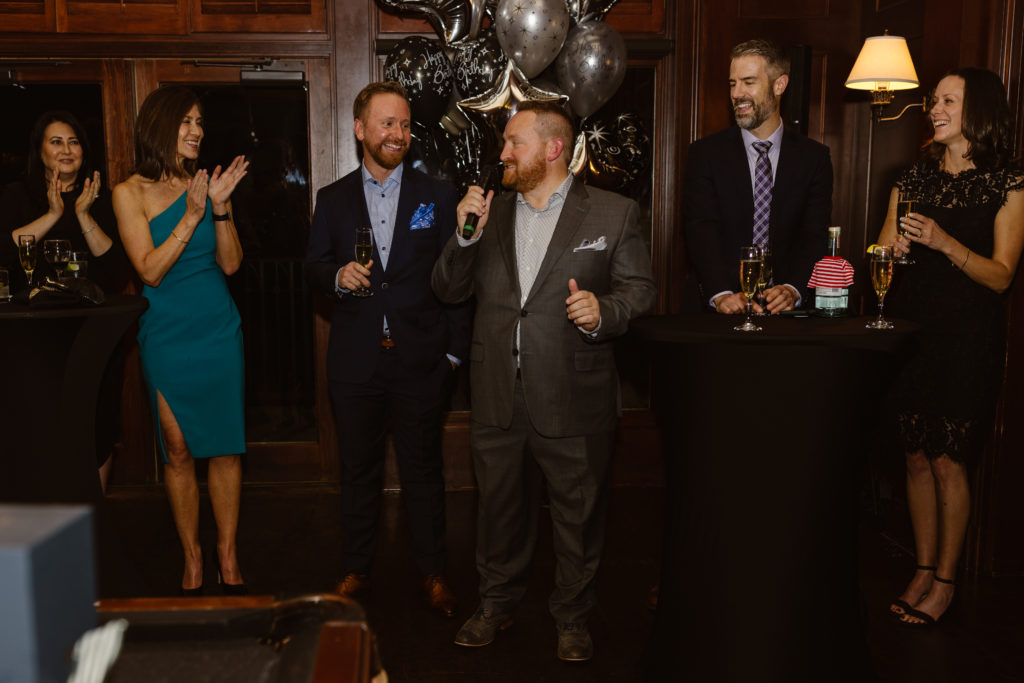 Candid of a speech at a 40th birthday party