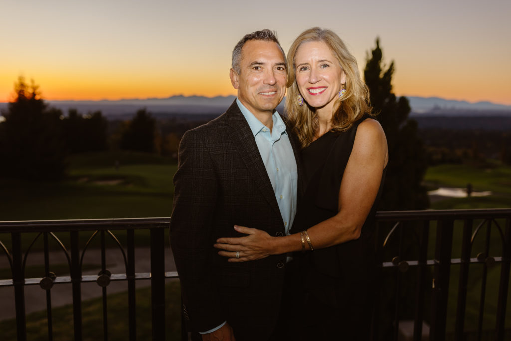 Portrait of a couple at a 40th birthday party.