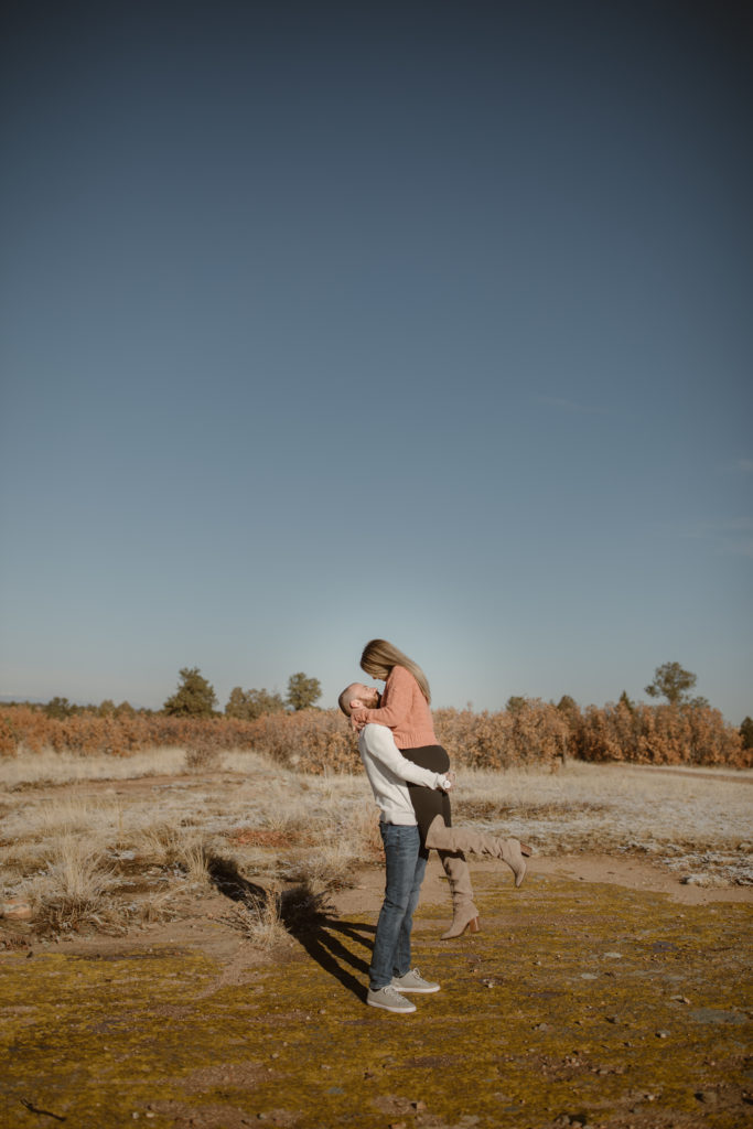 Man picked up his fiancé, couple looking at each other