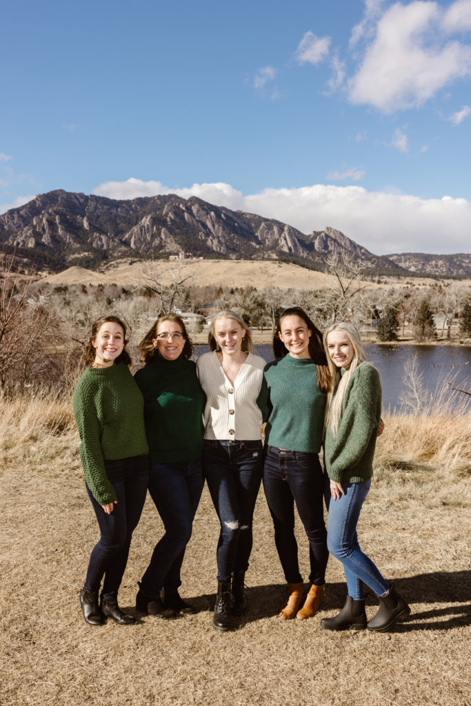 Mom, daughters and daughters in-law with the Flatirons in the background