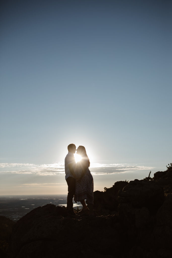 Silhouette of a couple about to kiss
