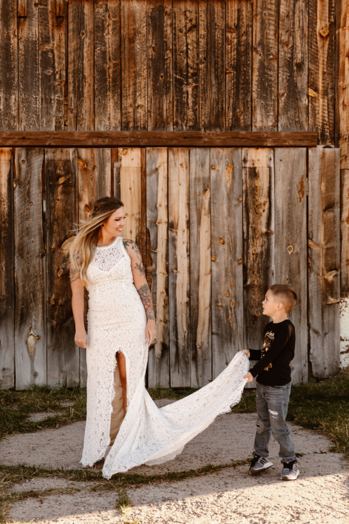 Nephew holding bride's train