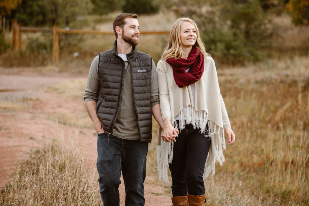 Couple holding hands walking