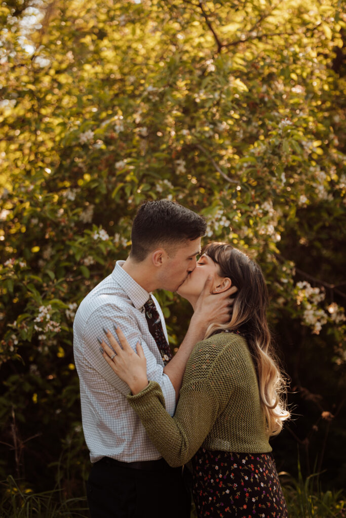 Couple embracing while kissing
