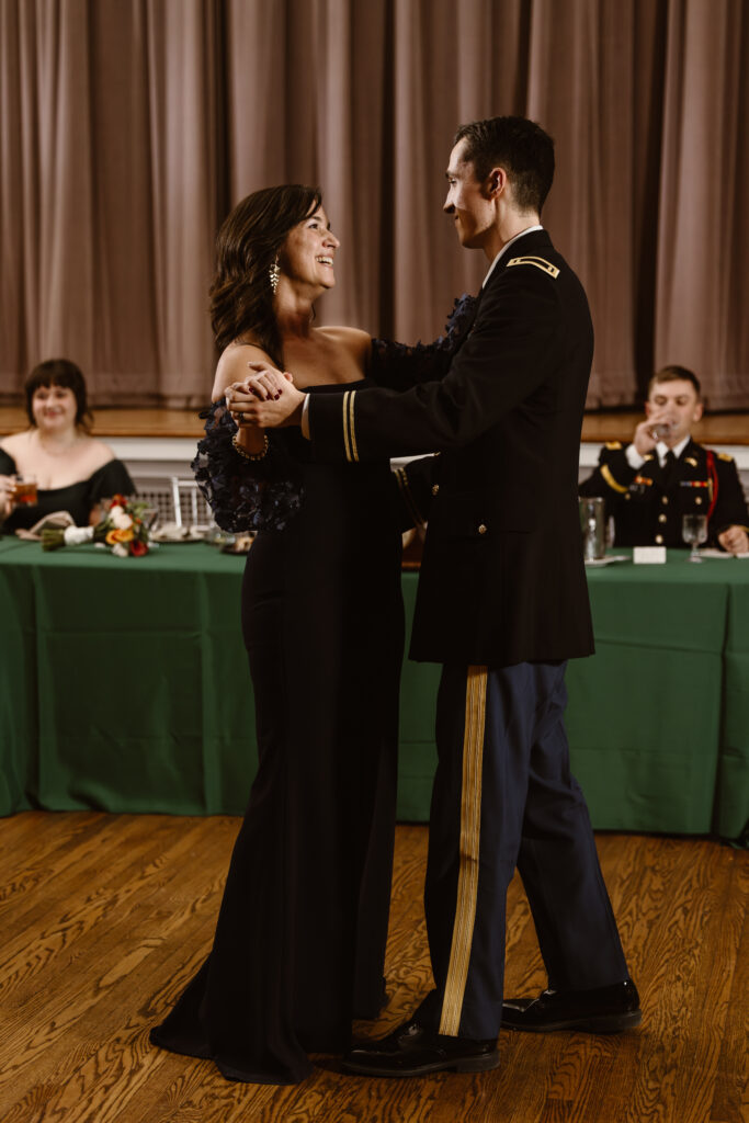 Groom dancing with his mother during a mother son dance