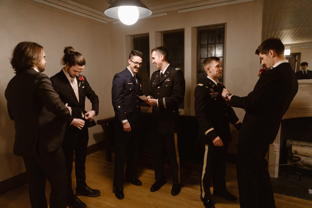 Groom and groomsmen making final adjustments before the ceremony